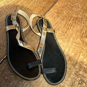 Jimmy Choo gold and black flat sandals  size 42 but fits a size 41